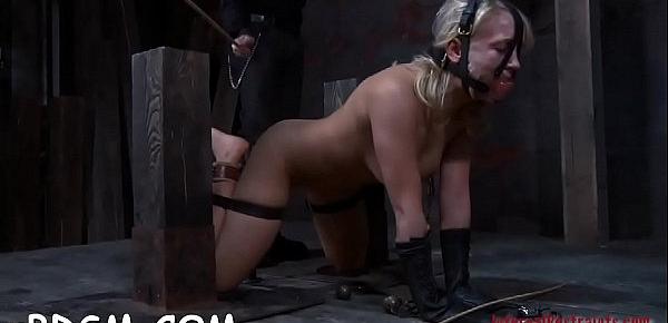  Clamped up honey gets a hook in her anal with toy torture